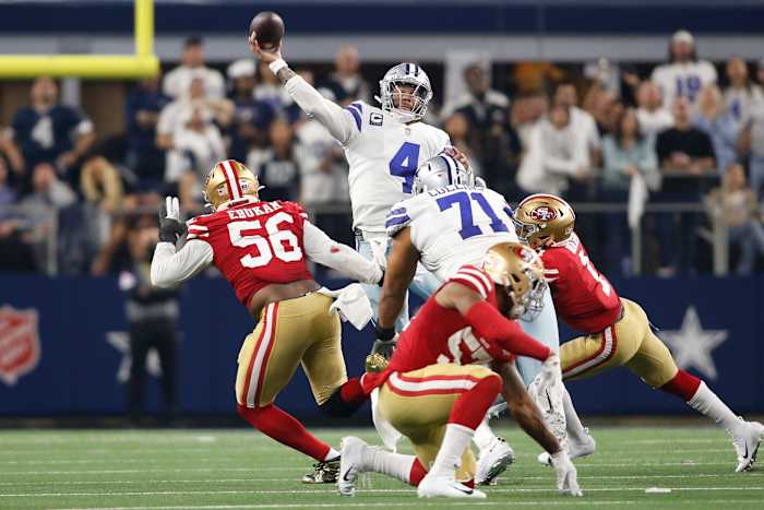 Dallas Cowboys quarterback Dak Prescott (4) throws a pass in the fourth quarter against the San Francisco 49ers in a NFC Wild Card playoff football game at AT&T Stadium.
